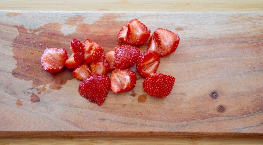 Cut strawberries for baby