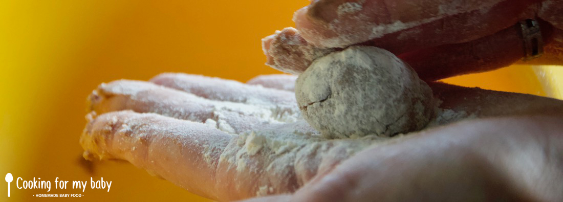 Shaping the biscuits with the dough for baby