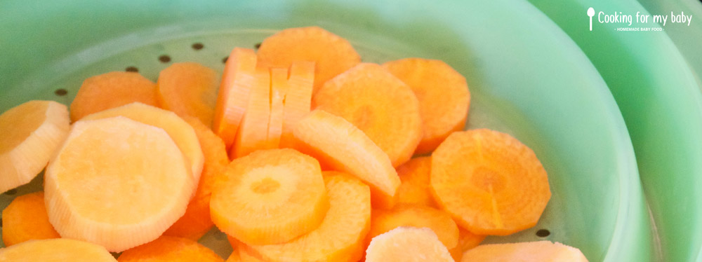 Steam cooking carrot and sweet potato for baby