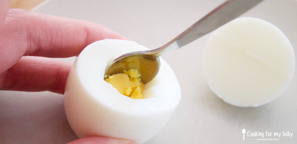 Extracting the yolk from the egg for baby's egg mimosa