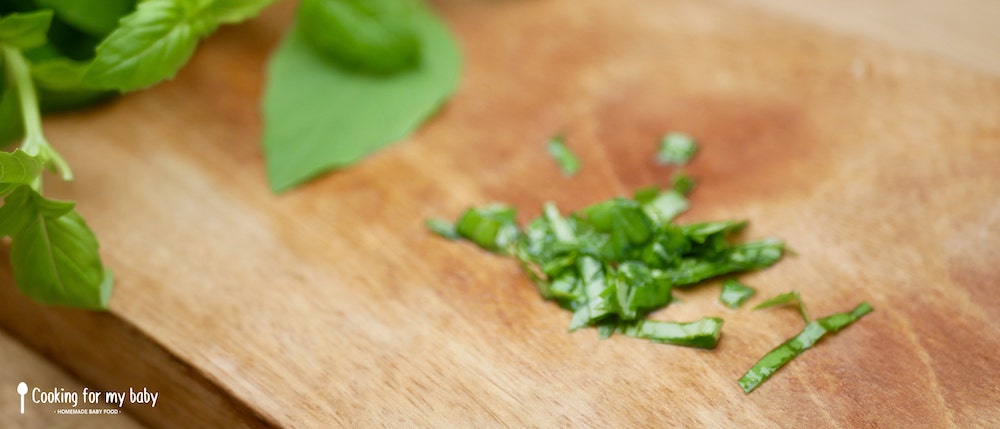 Finely chopped fresh basil for baby