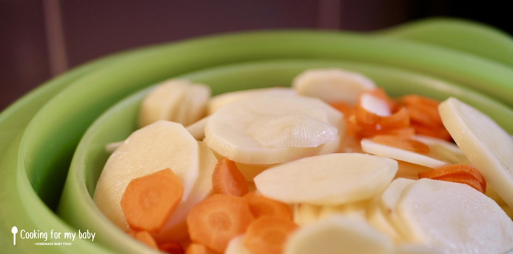 Steamed potatoes and carrots for baby