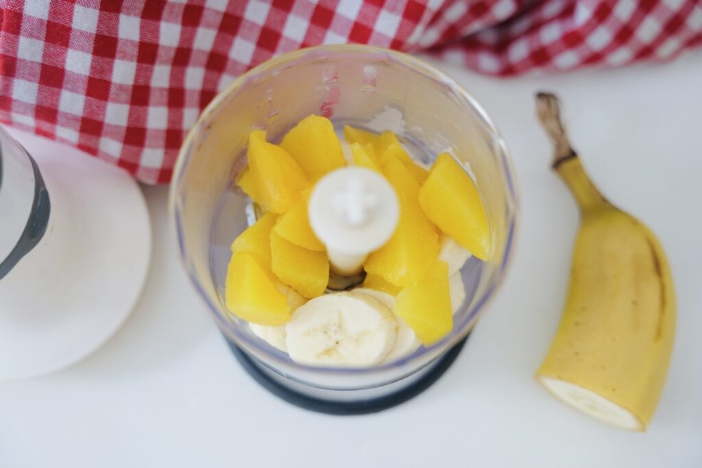 Blending the nectarine and banana for baby’s fruit purée