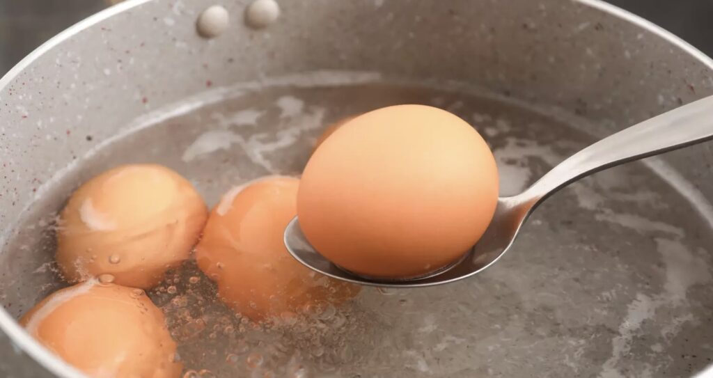 Cooking the eggs in boiling water