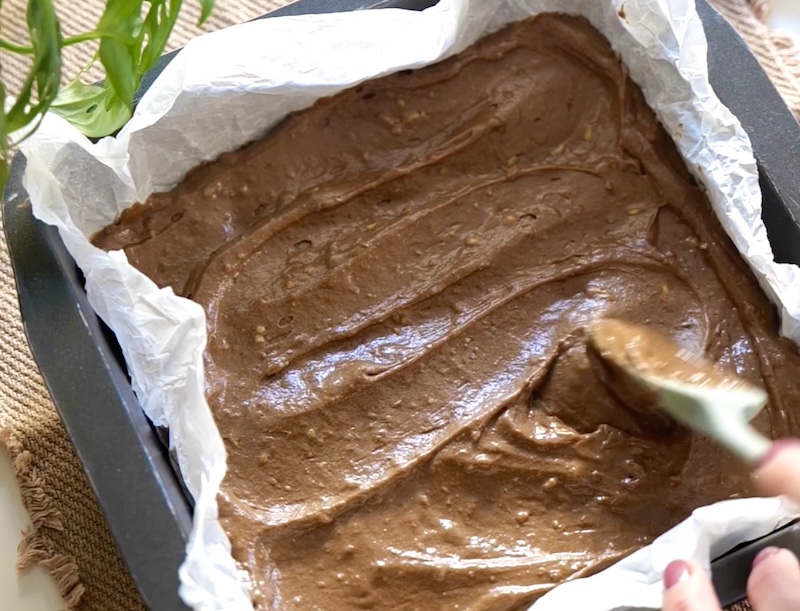 Smooth the brownie batter with a spatula