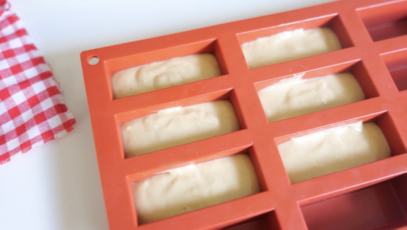 Silicone molds filled 2/3 full with cake batter